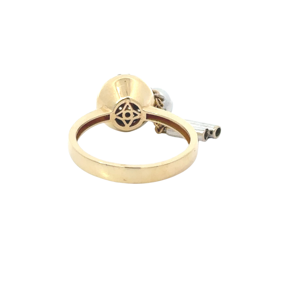 Flat-lay image of the 14k gold circle CZ ring, with a focus on its refined circular design.