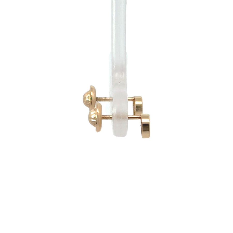 Close-up of 14k gold stud with cubic zirconia center