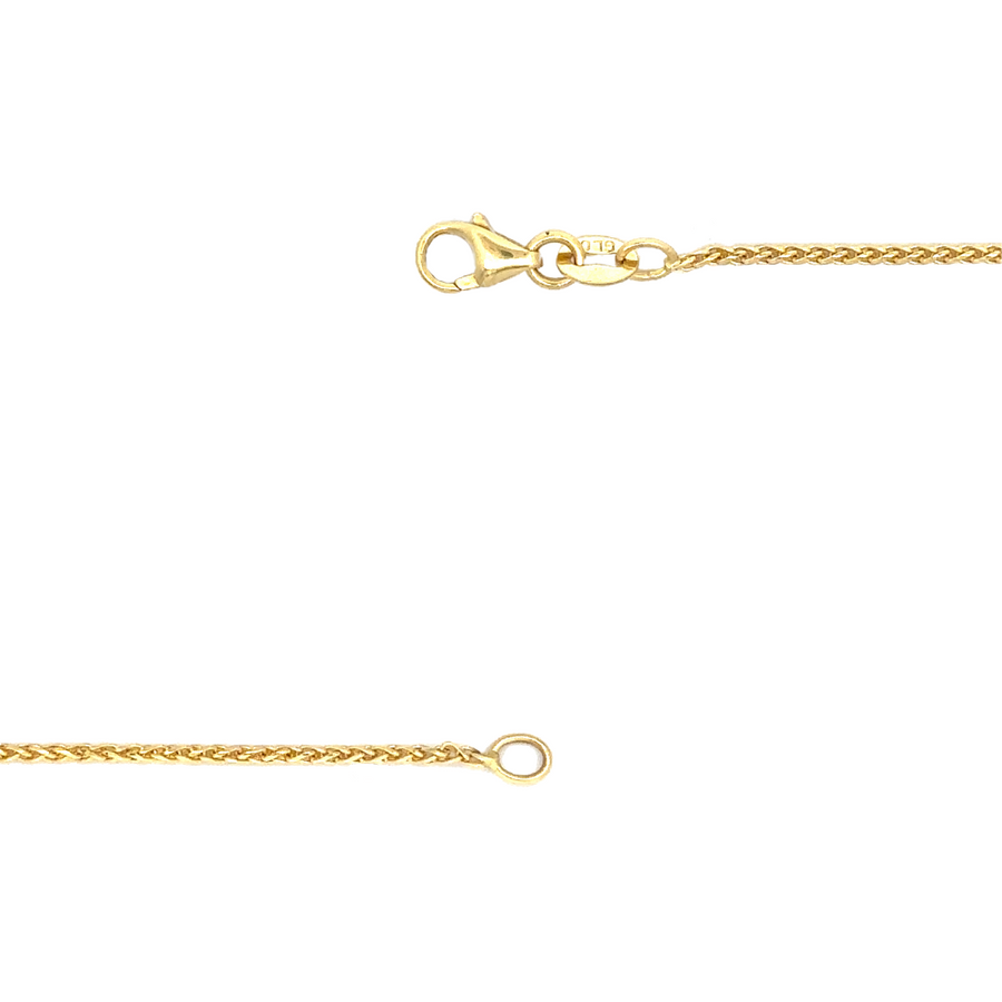 14k gold diamond-cut chain displayed on a neutral fabric background
