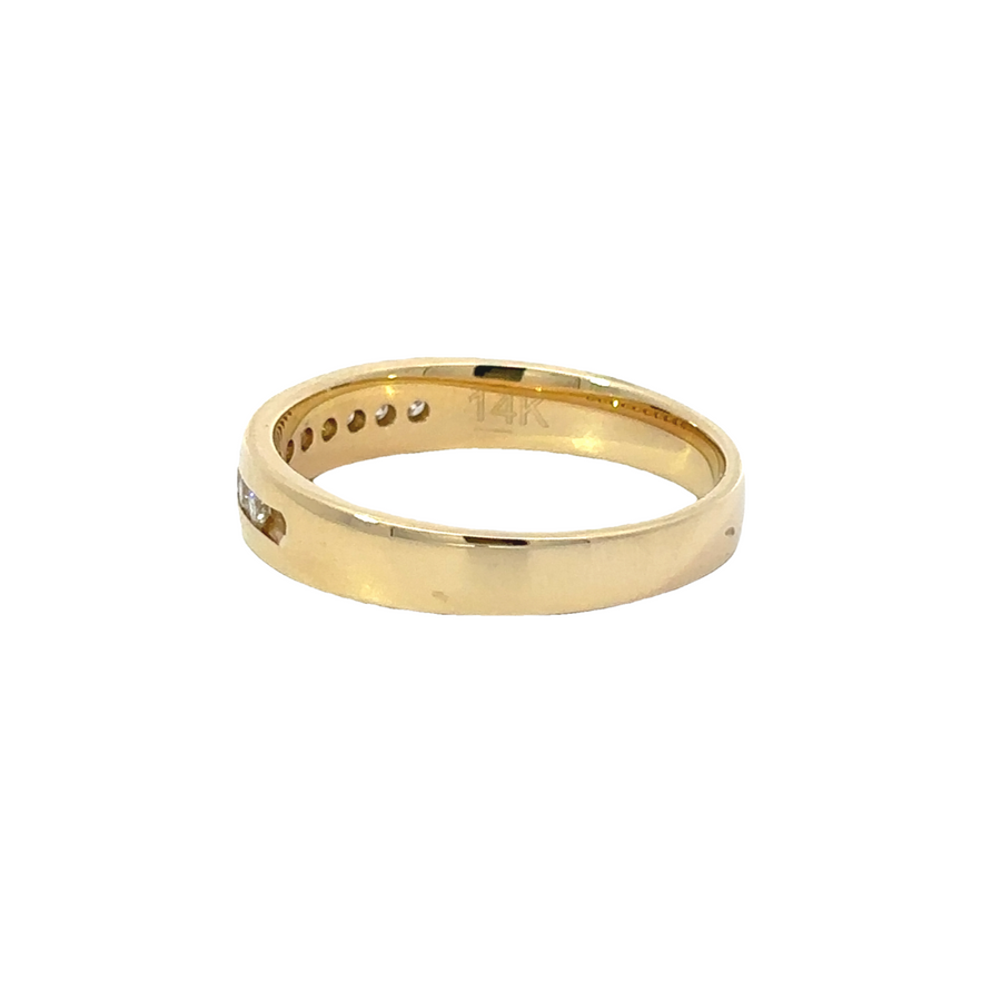Sleek men’s gold ring with diamond accents
