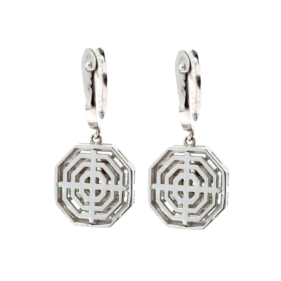 Side view of 14k gold earrings showcasing diamond brilliance