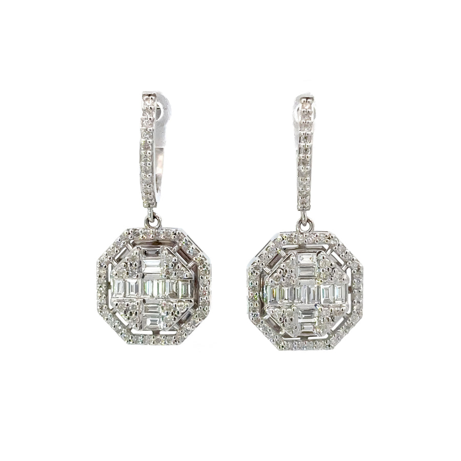 Close-up of brilliant diamonds set in 14k gold earrings
