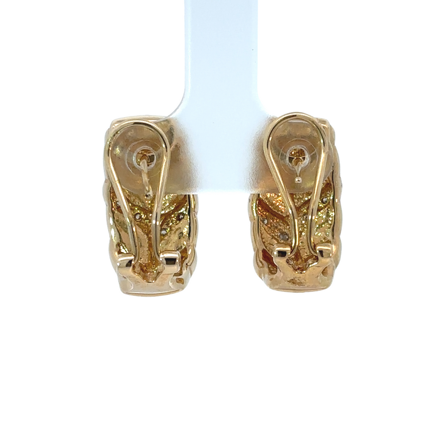 Classic round diamond earrings crafted in 14k gold