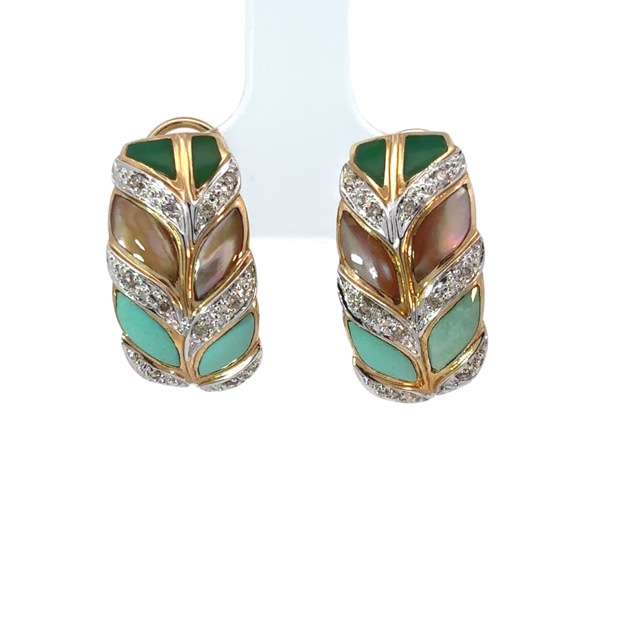 Close-up of 14k gold diamond earrings sparkling brightly