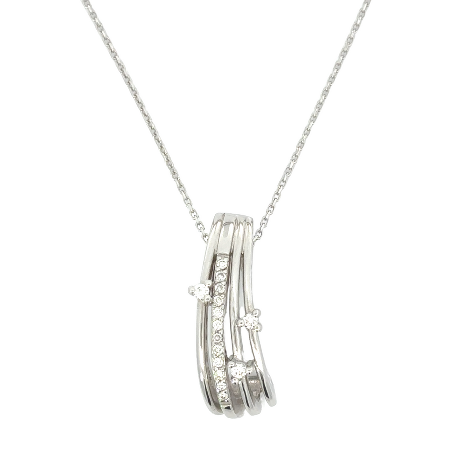 Close-up of diamond pendant featuring .16 CT centerpiece