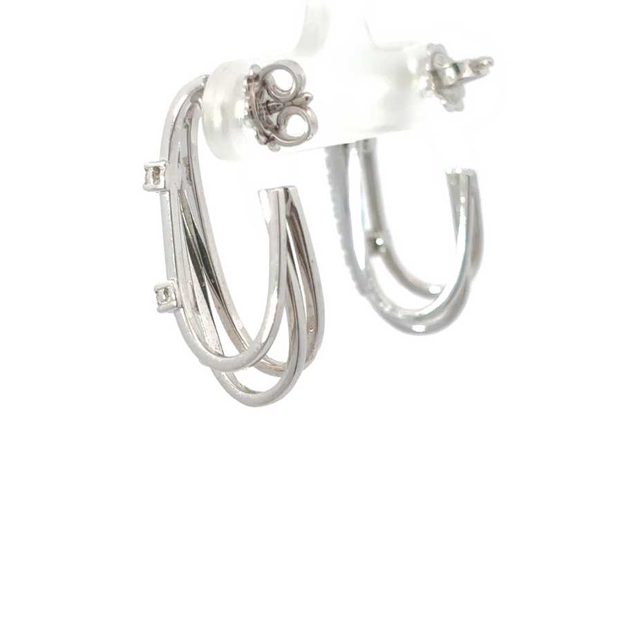 Side view of earrings showing secure backing and gold detail