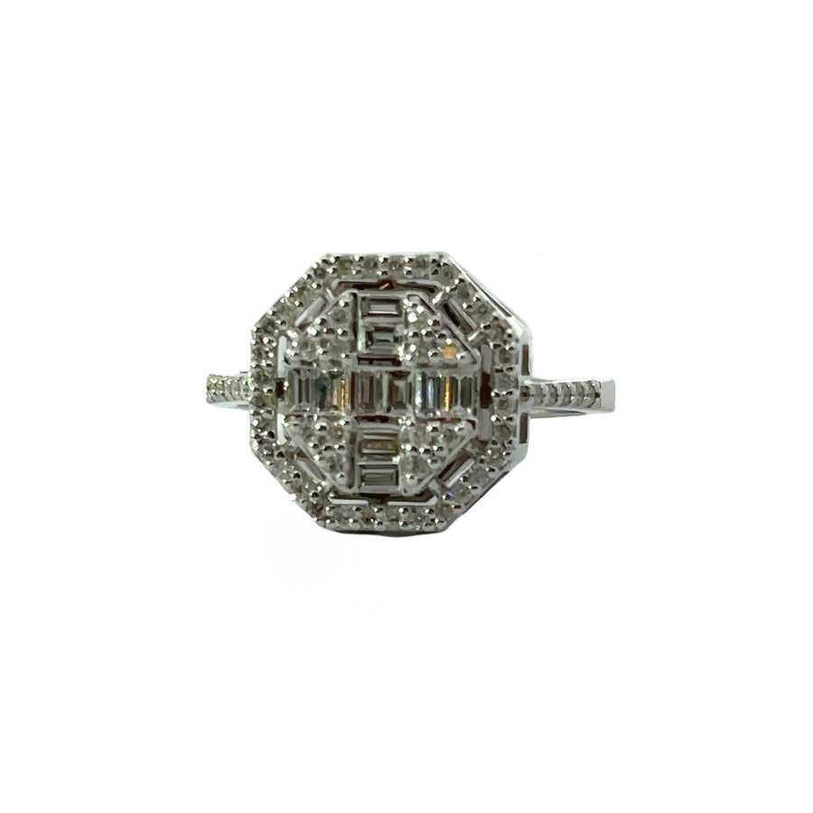 Close-up of a classic 14k gold diamond ring