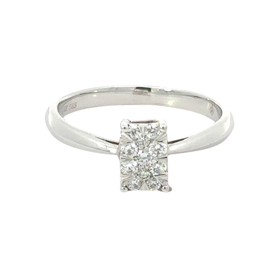 Polished 14k gold ring with brilliant diamonds on white background