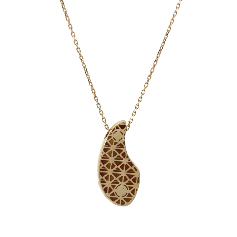 Detailed shot of the 14k gold drop pendant, emphasizing its minimalist design and smooth finish.