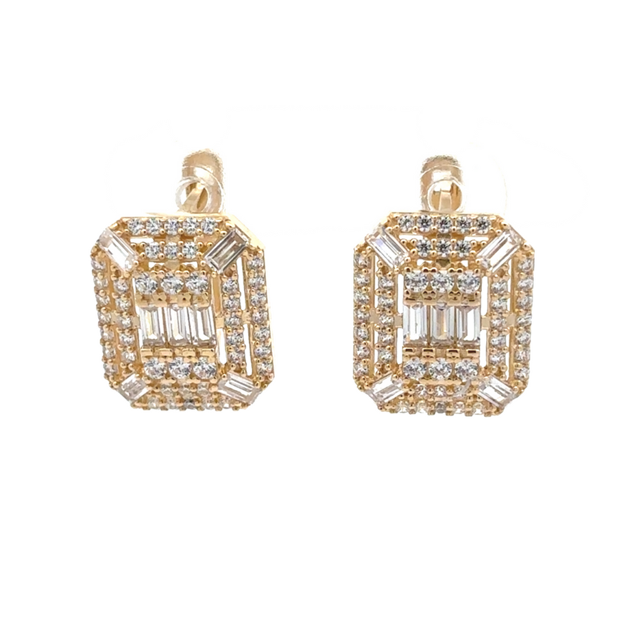 Close-up view of 14k gold earrings with a polished finish
