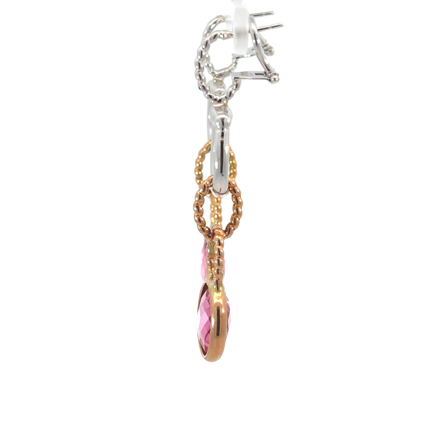 Elegant two-tone earrings featuring soft pink accents