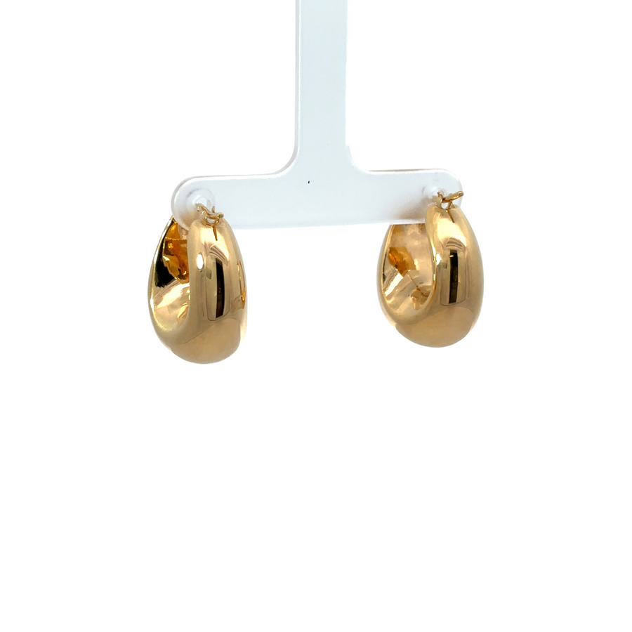 Close-up of 14k gold earrings showing sleek design