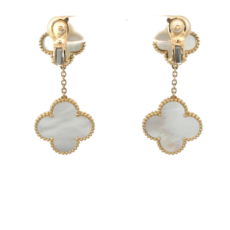 14k gold earrings displayed in a soft velvet jewelry box