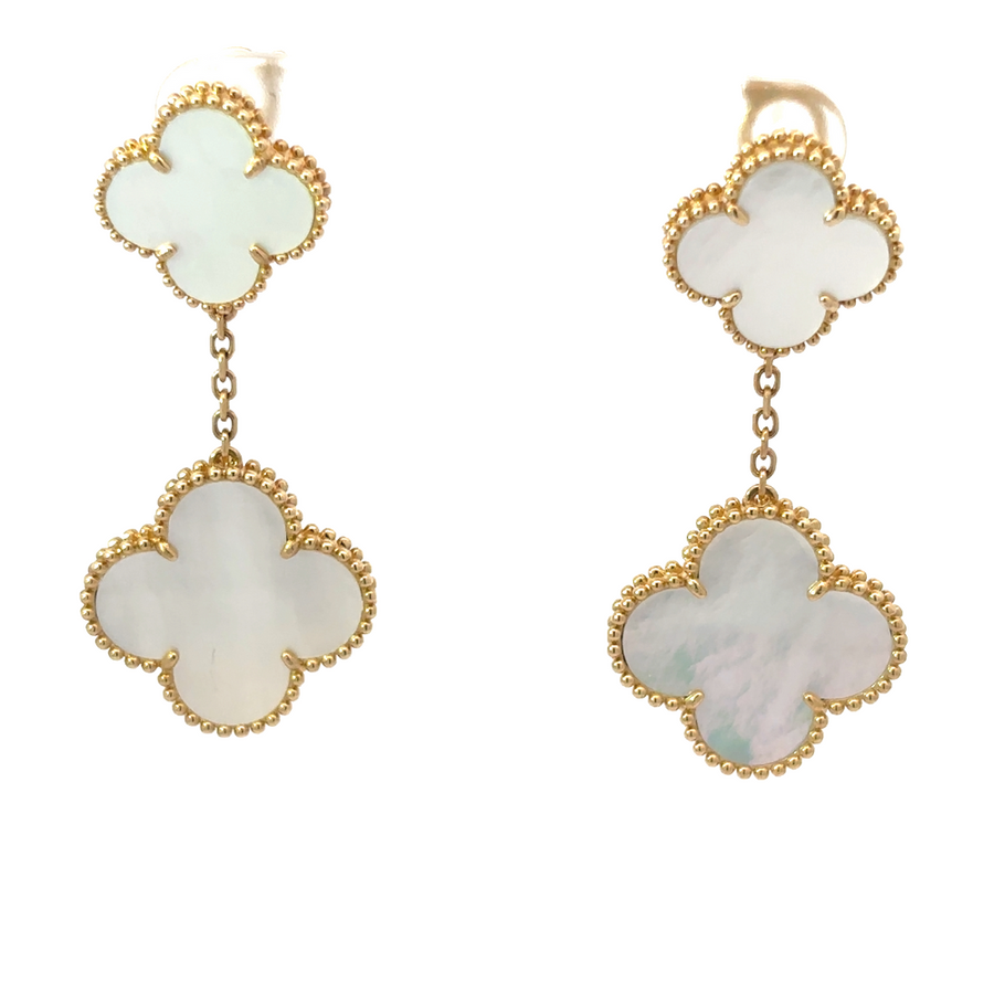 Pair of 14k gold earrings with polished finish on white background