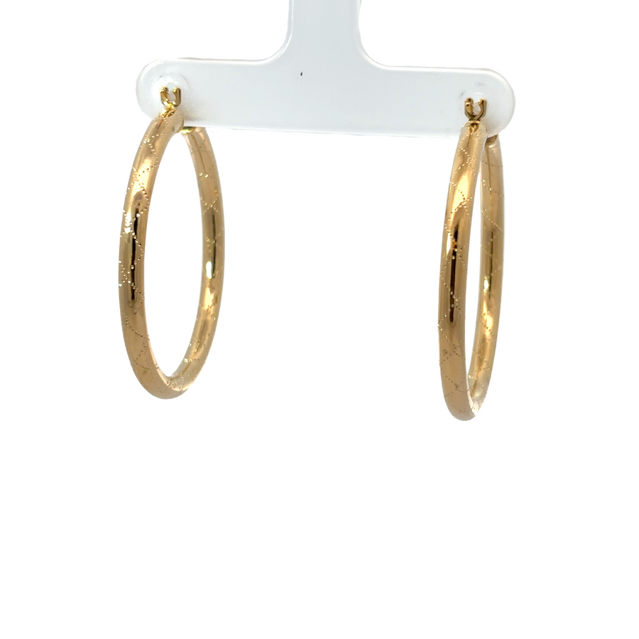 14k gold earrings paired with formal attire