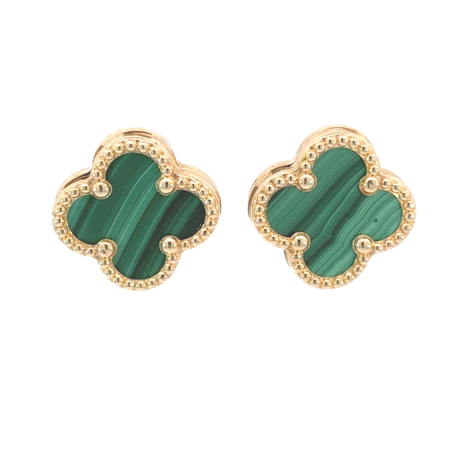 Pair of 14k gold earrings on white background