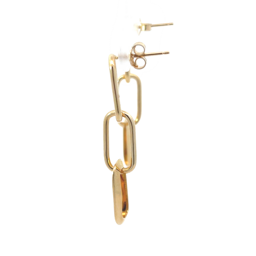 Model wearing the 14k gold earrings, showcasing their versatility and timeless elegance.