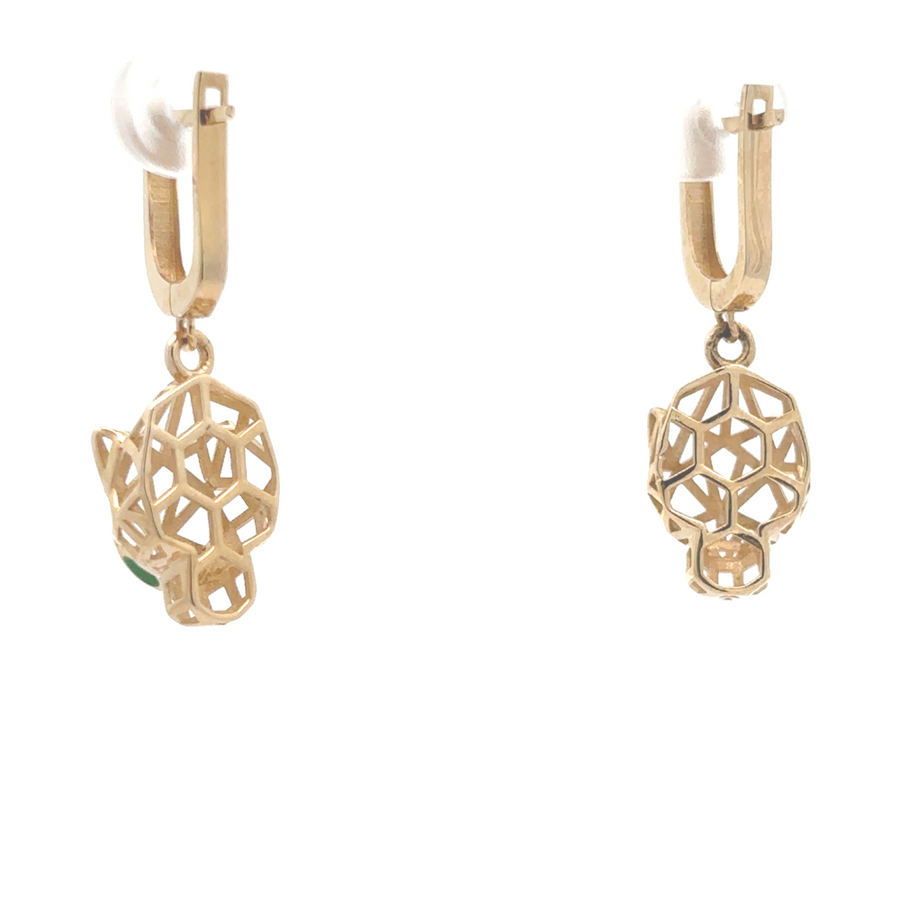 Woman wearing 14k gold earrings with formal attire for a chic look