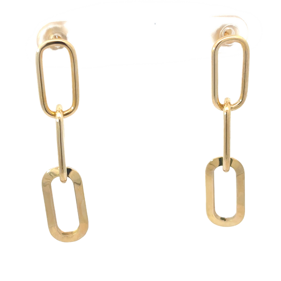 Close-up shot of the 14k gold earrings, highlighting their minimalist design and radiant shine.