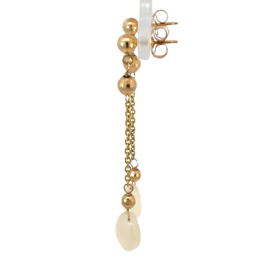 Gold necklace with large center quartz stone