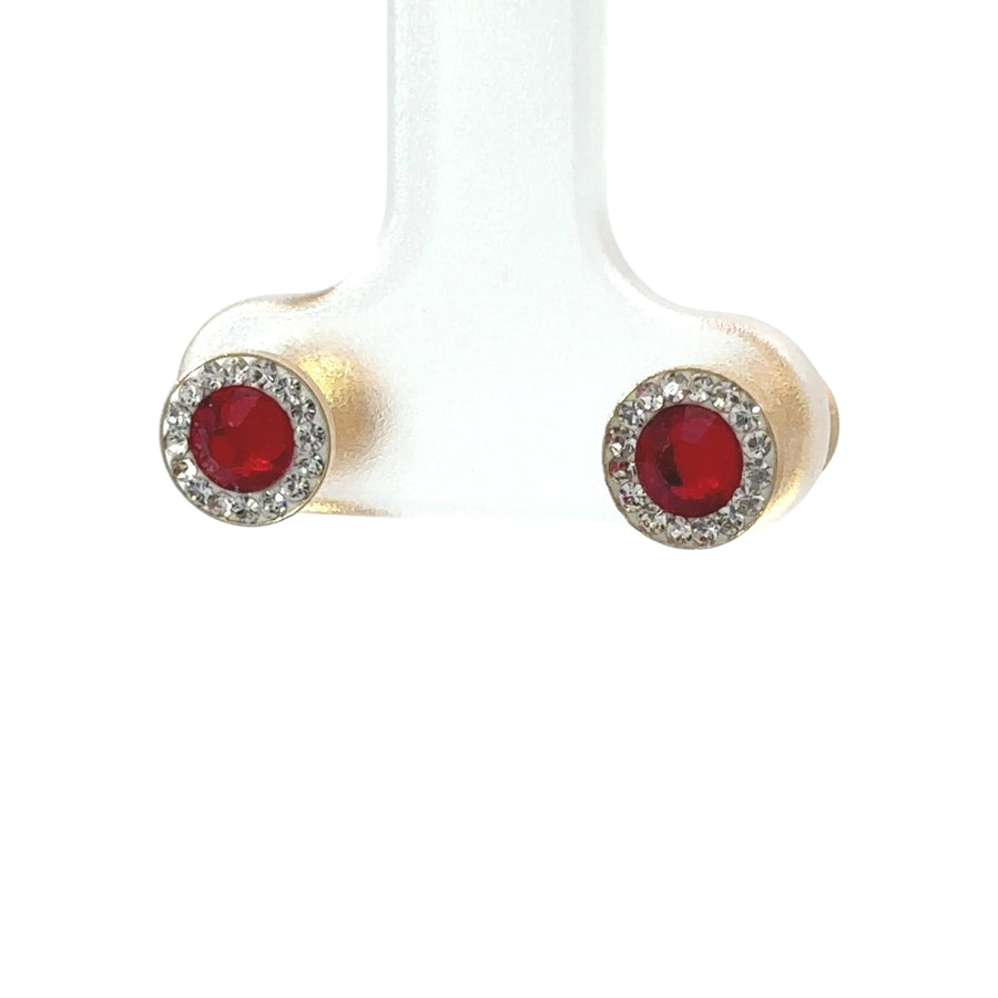 Close-up of delicate 14k gold earrings for women and babies