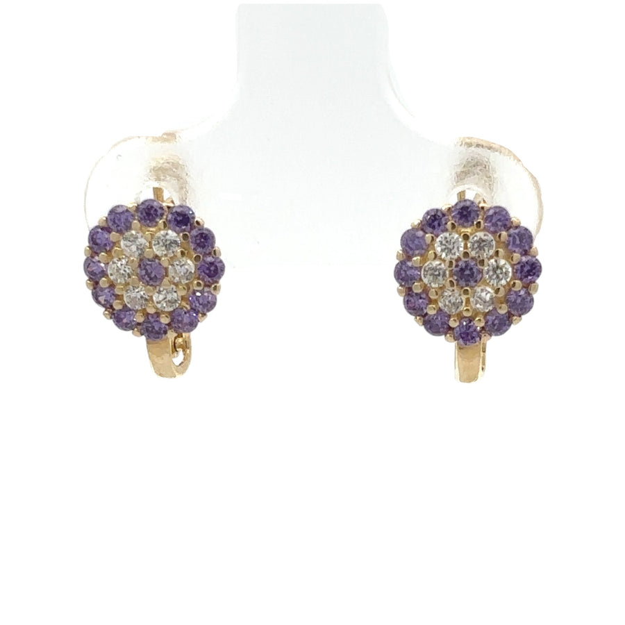 Pair of classic 14k gold earrings on white background
