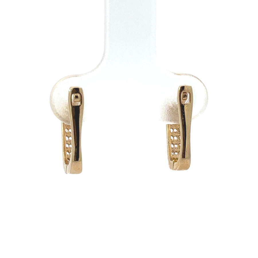 Elegant 14k gold earrings shown with formal attire