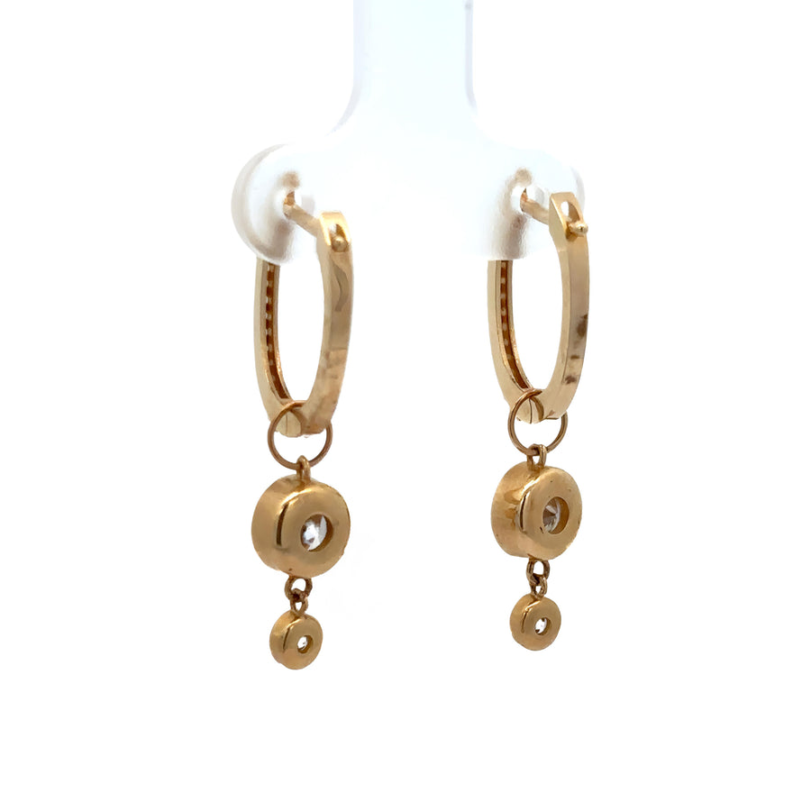 Timeless 14k gold earrings displayed in jewelry box