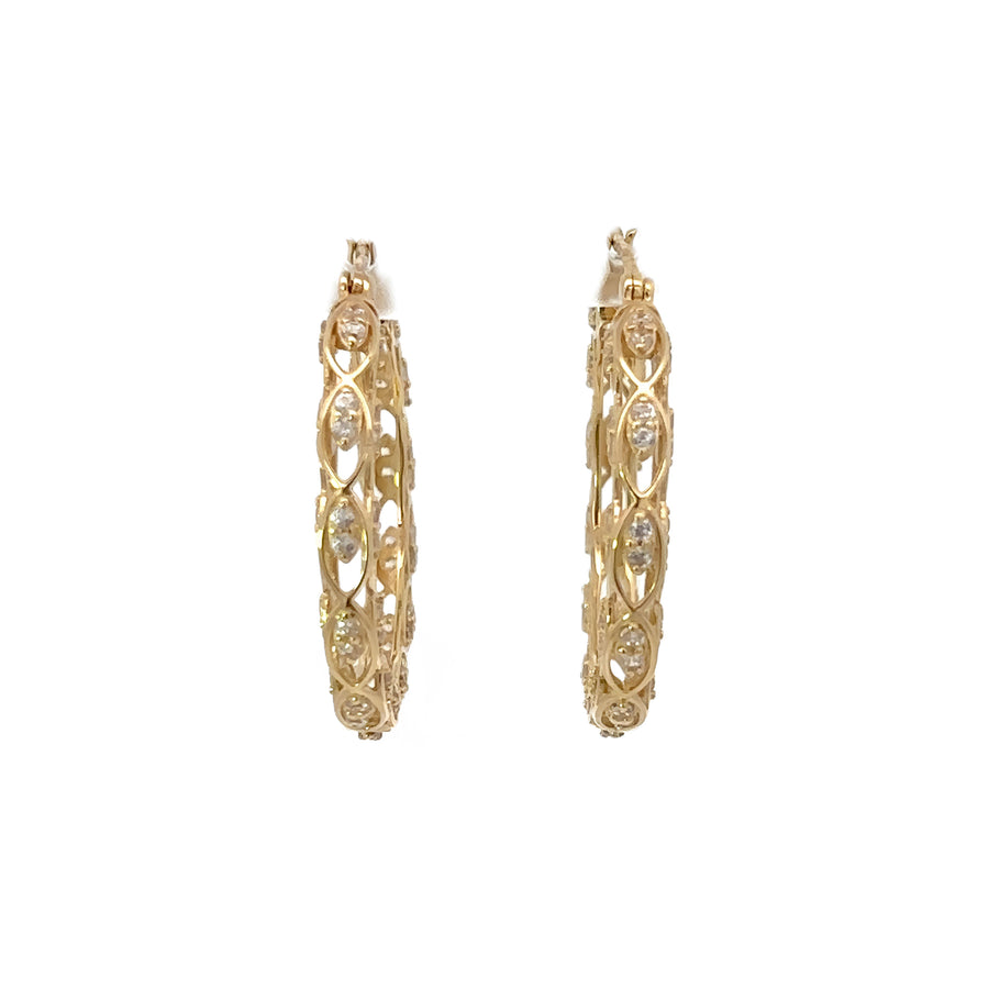 14k gold earrings for women displayed on a white background