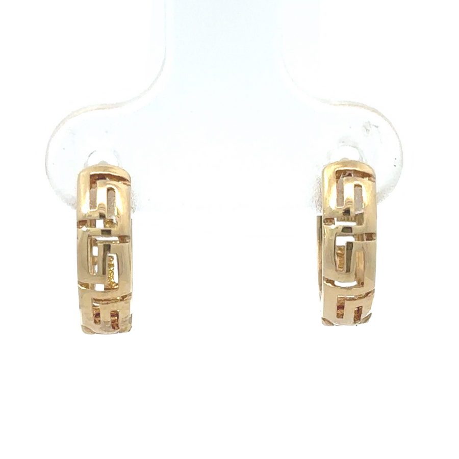 14k gold earrings on a soft neutral background, emphasizing their lightweight nature