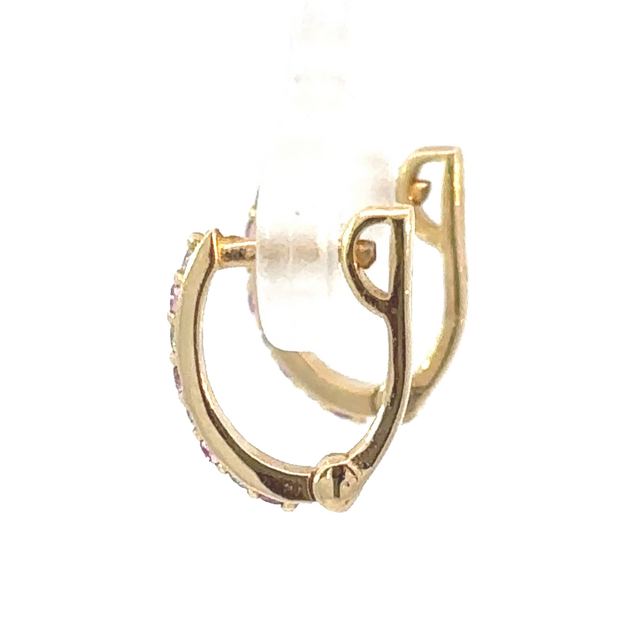 Classic 14k gold earrings featuring a radiant 0.08 CT diamond