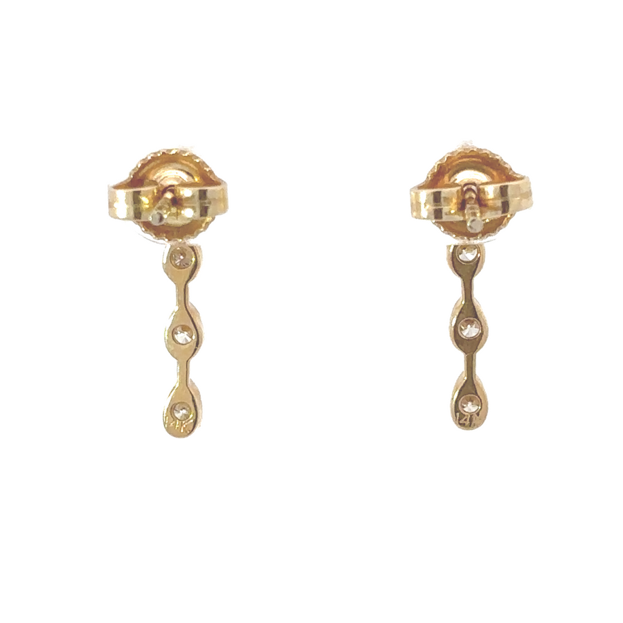 Close-up of diamond earrings on white background