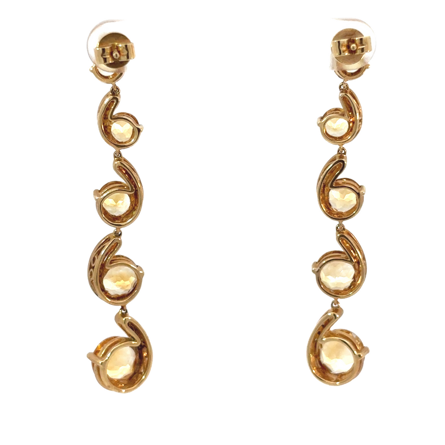 Elegant gold earrings featuring citrine and diamonds