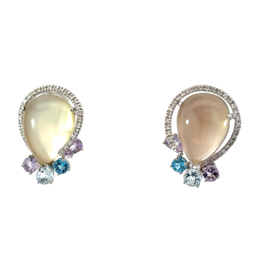 14k gold earrings with diamonds on white background