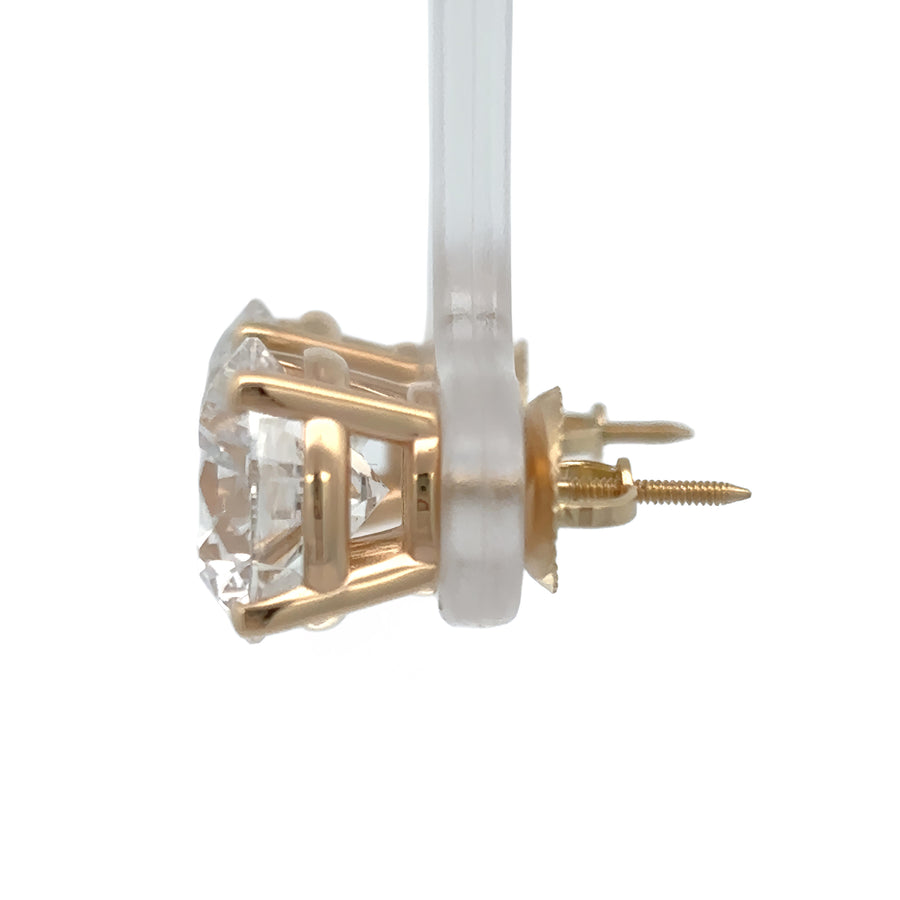 Earrings displayed in a luxury jewelry box