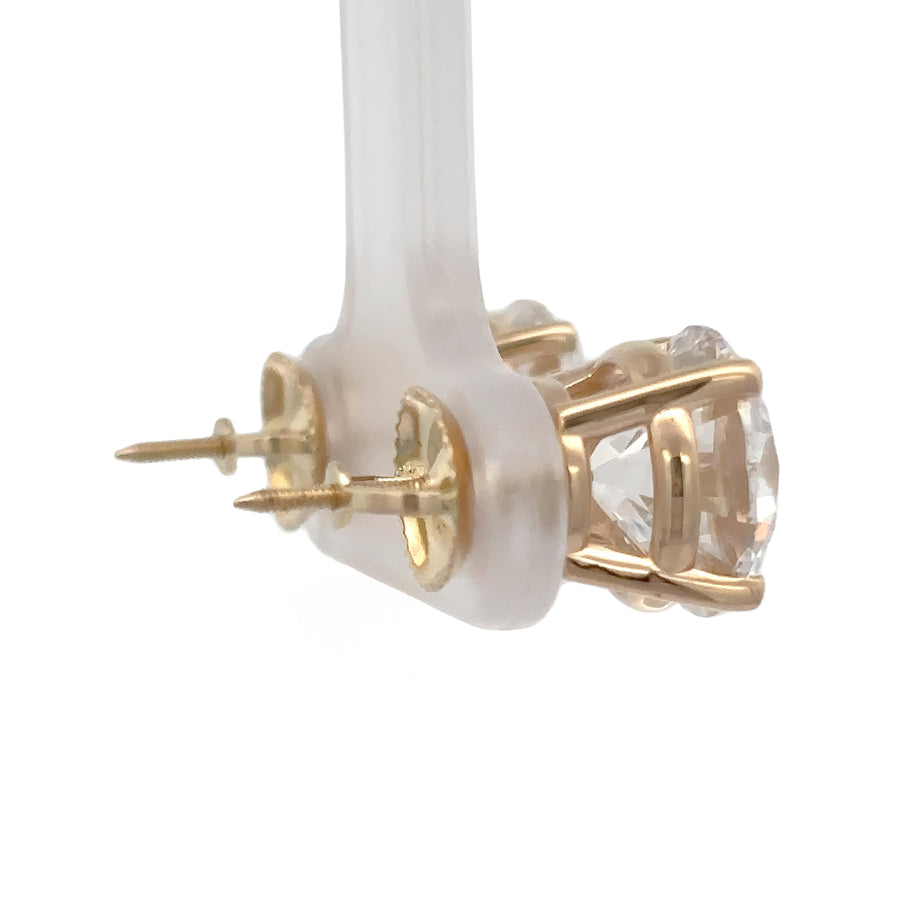 14k gold earrings styled with formal outfit
