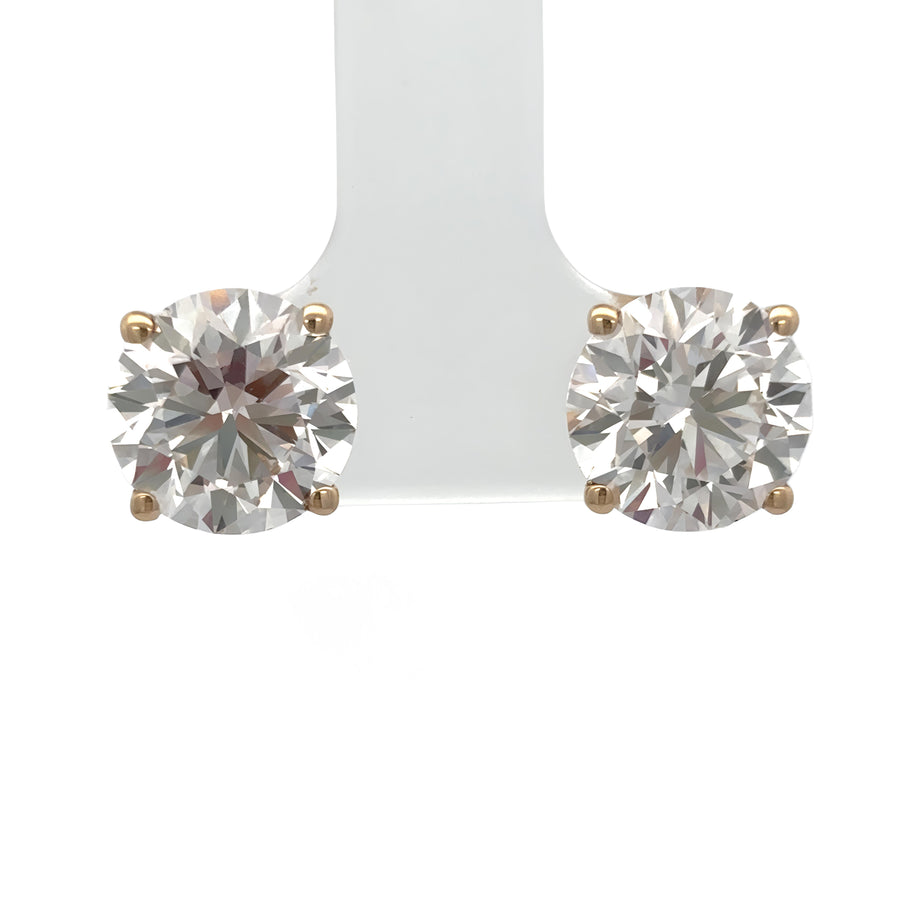 14k gold earrings with lab-grown diamonds on white background
