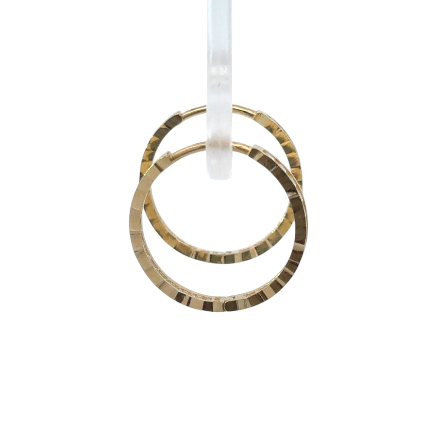 Elegant 14k gold hoop earrings featuring sparkling CZ stones