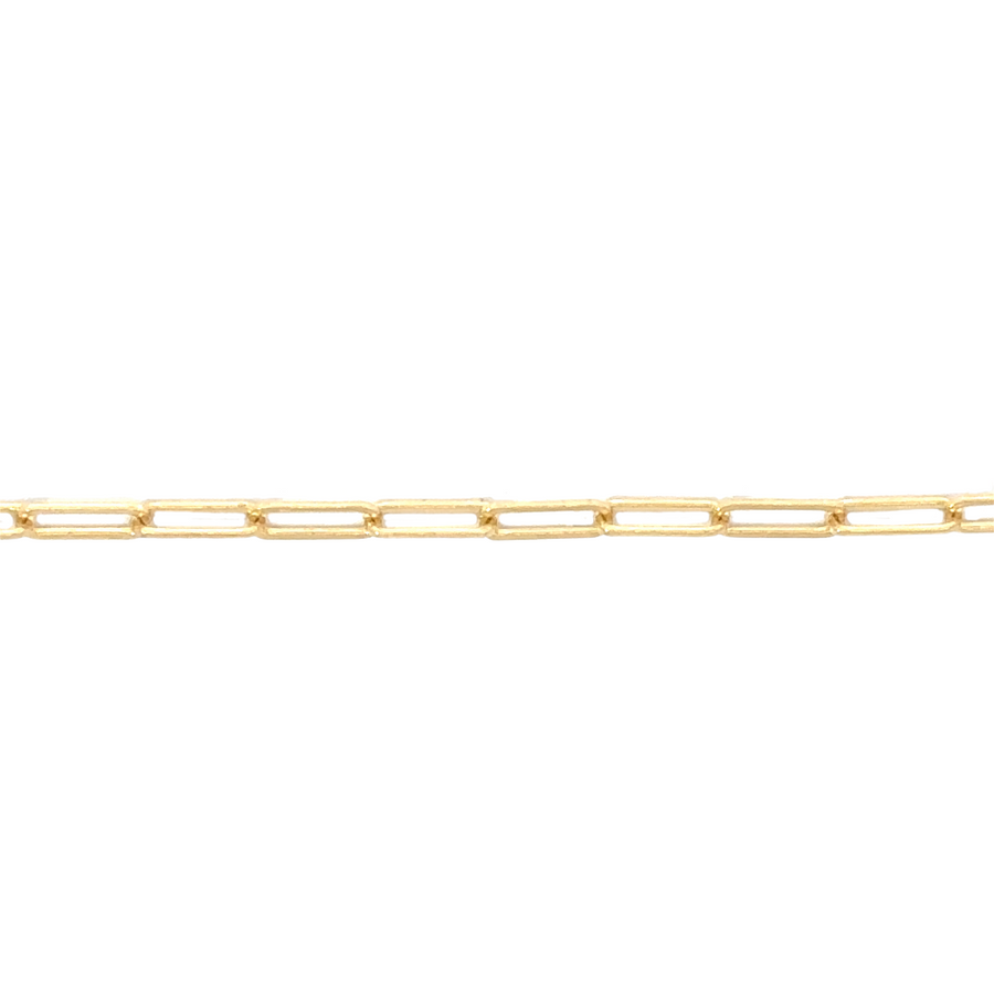 14k gold fancy chain necklace draped over a jewelry stand