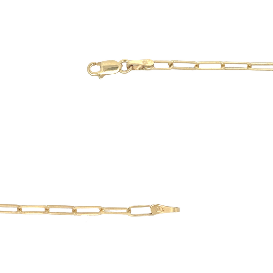 Model wearing the 14k gold necklace, styled as a standalone piece for a minimalist yet refined look.