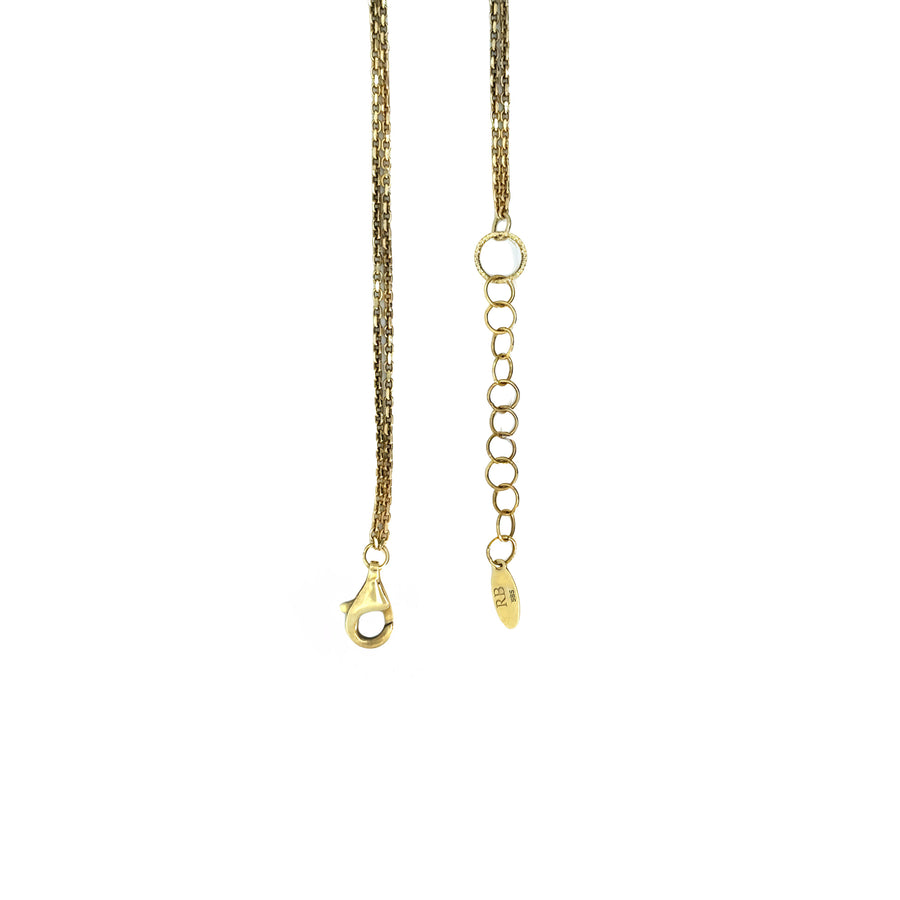 Layered necklaces including 14k gold Flow Lab Circle design