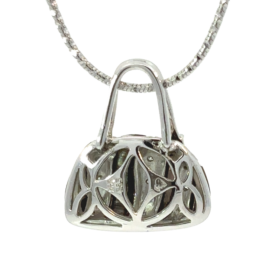 Luxury women’s pendant with handbag design and diamond sparkle