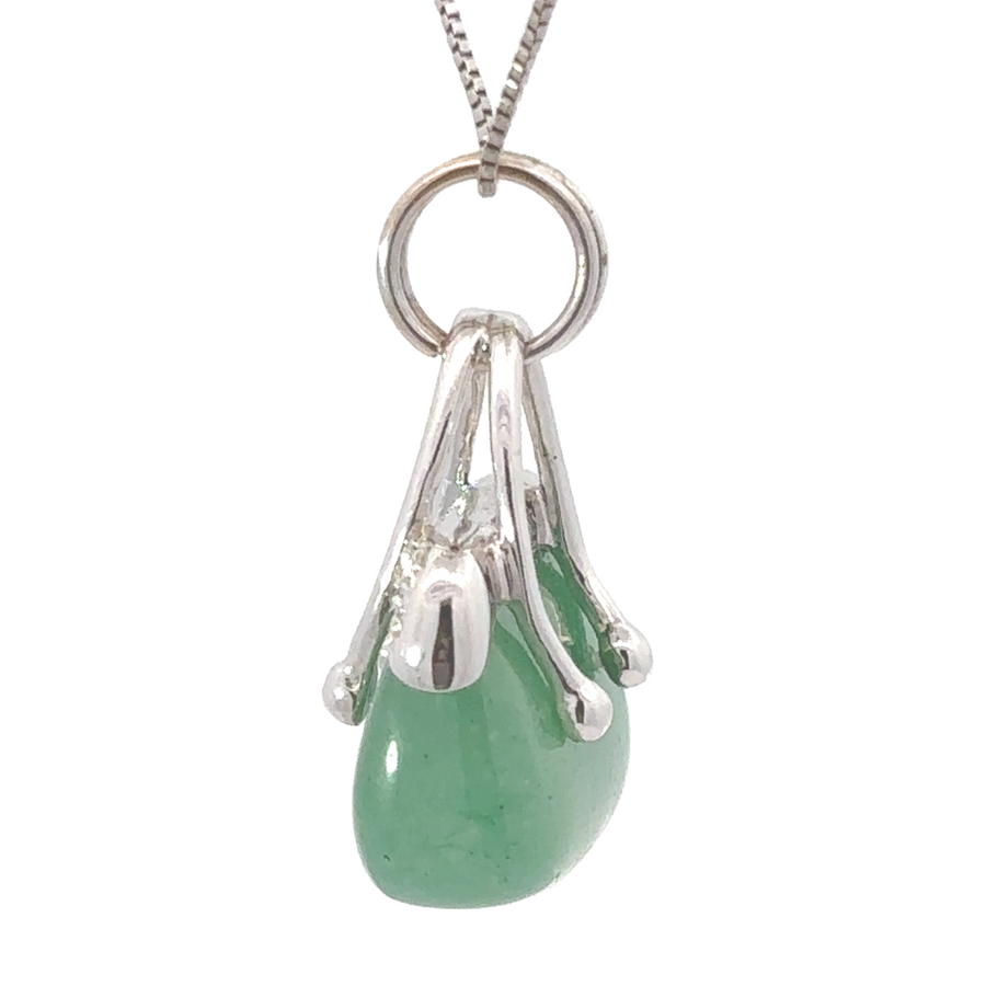 Elegant women’s pendant shaped like a handbag with diamonds
