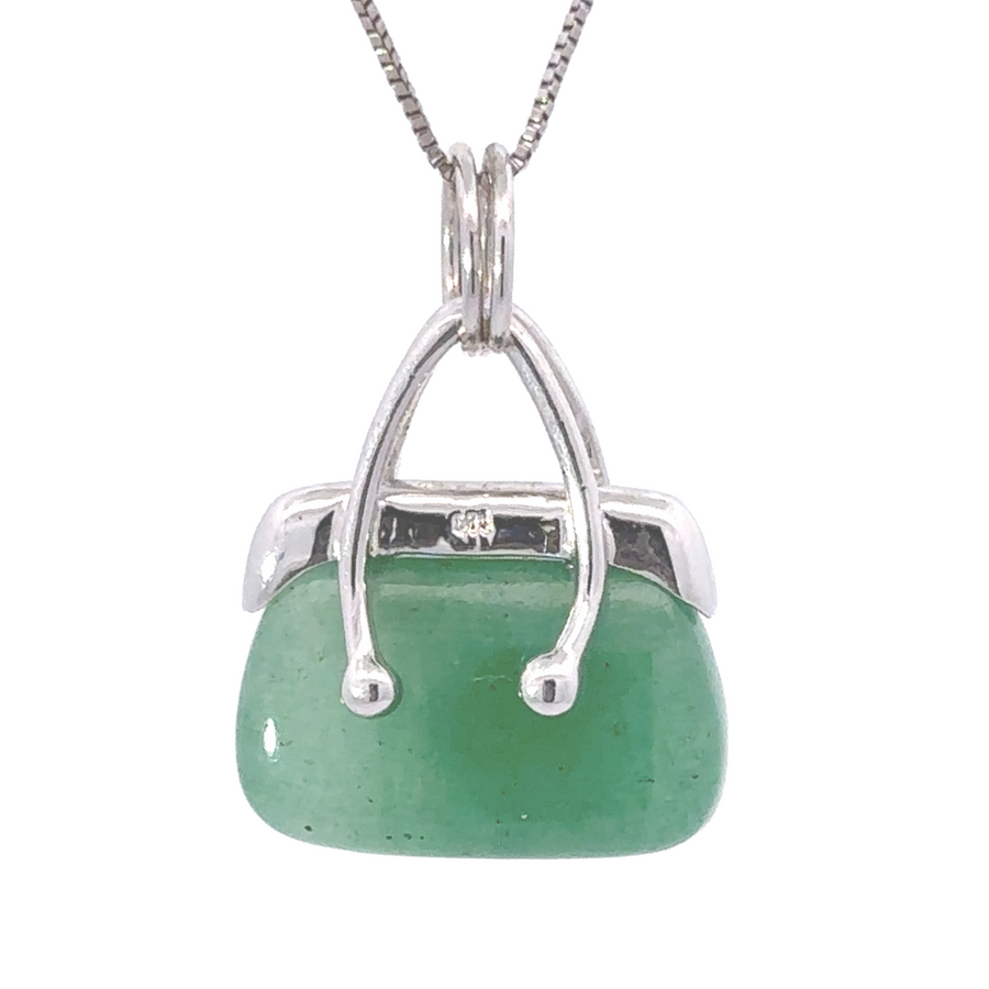 Handbag pendant on white background showcasing diamond details