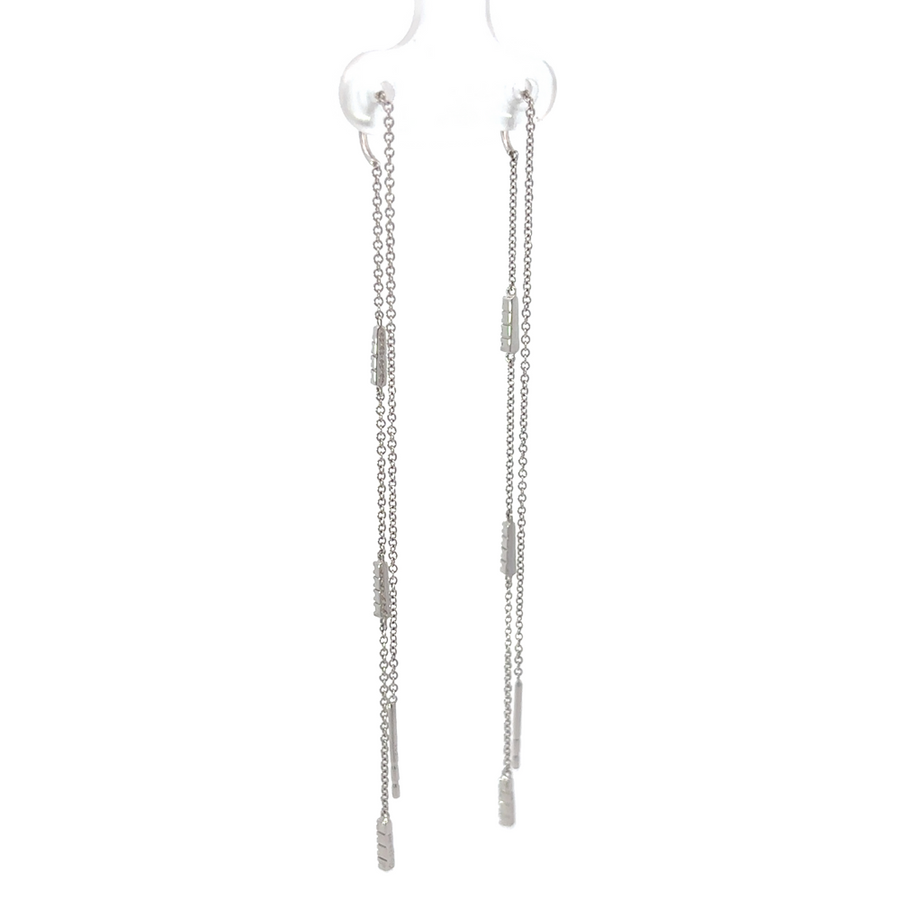 Pair of 14k gold earrings with brilliant-cut diamonds
