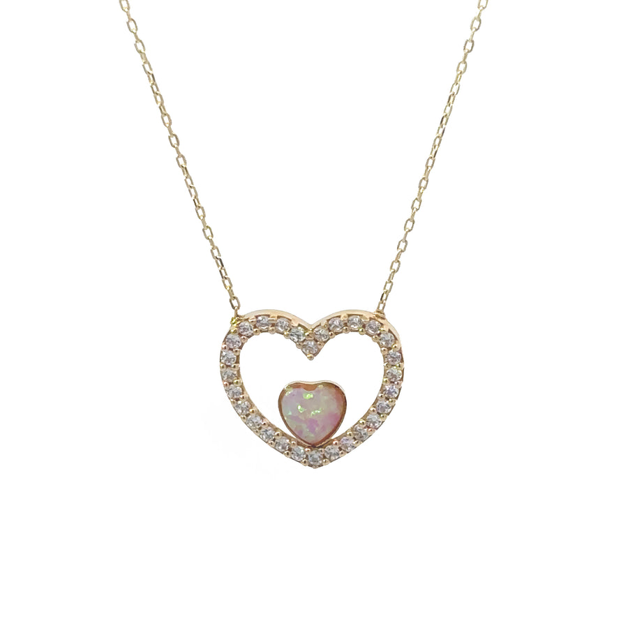 Minimalist heart necklace shown on white background