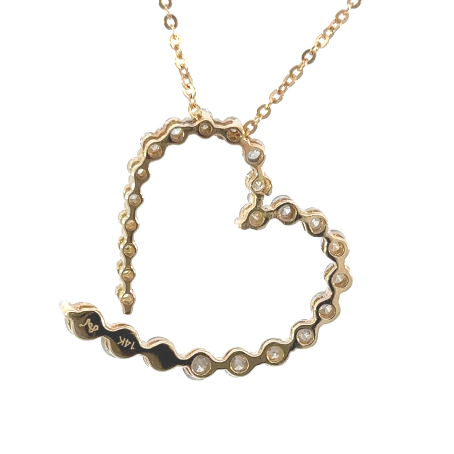 Women’s 14k gold pendant with heart design and diamonds