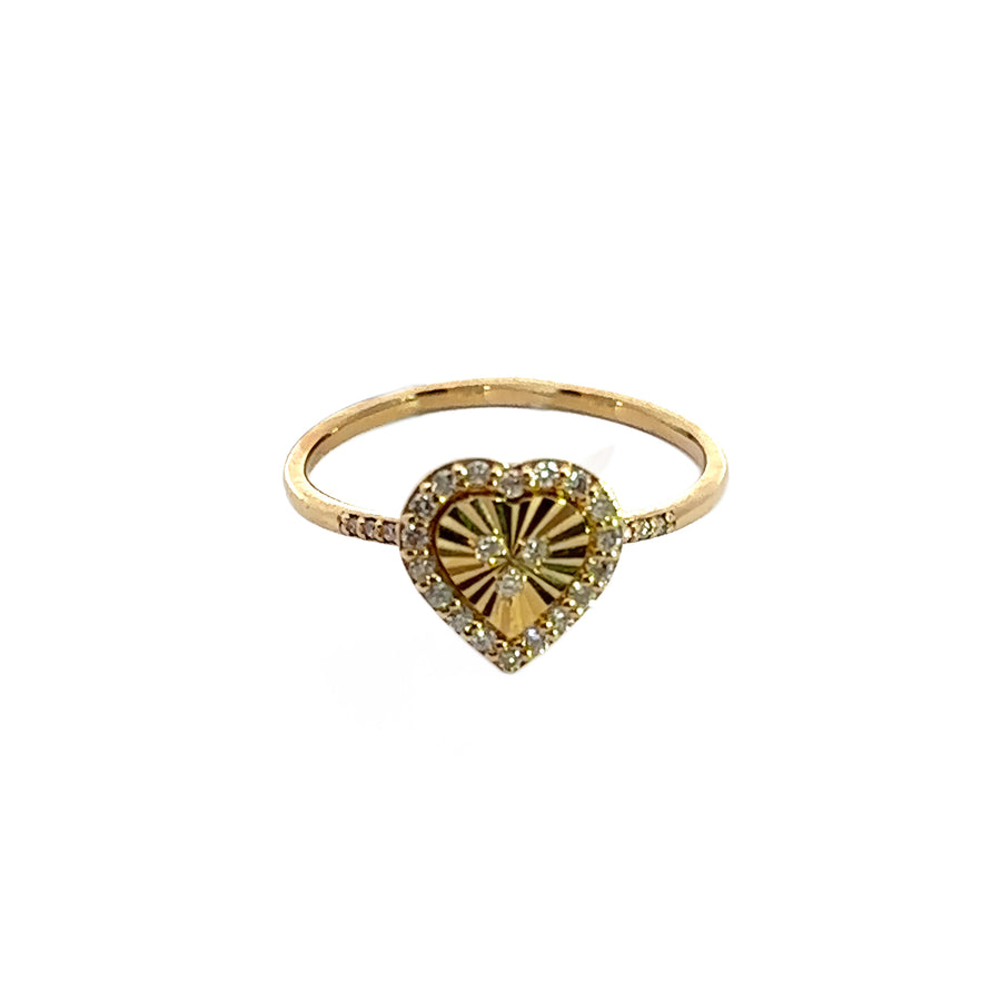 Elegant 14k gold ring featuring heart shape and diamond