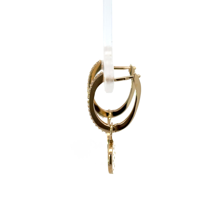 Lightweight gold earrings with minimalist charm detail