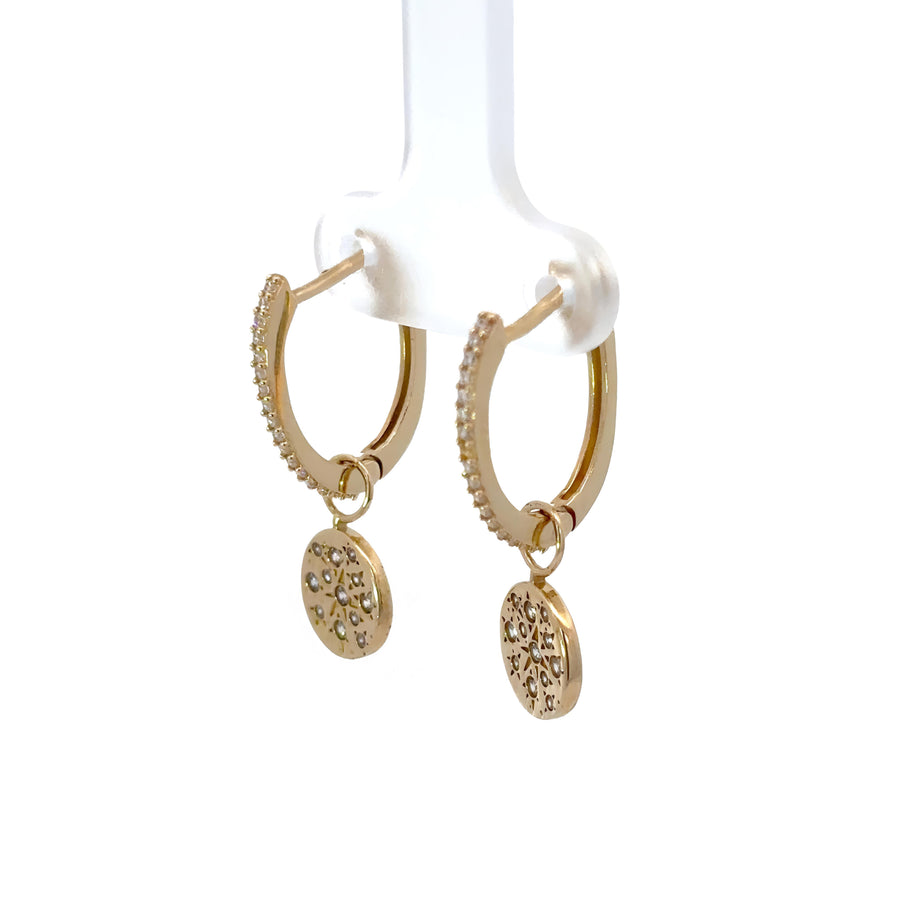 Pair of gold huggies with hanging circle elements